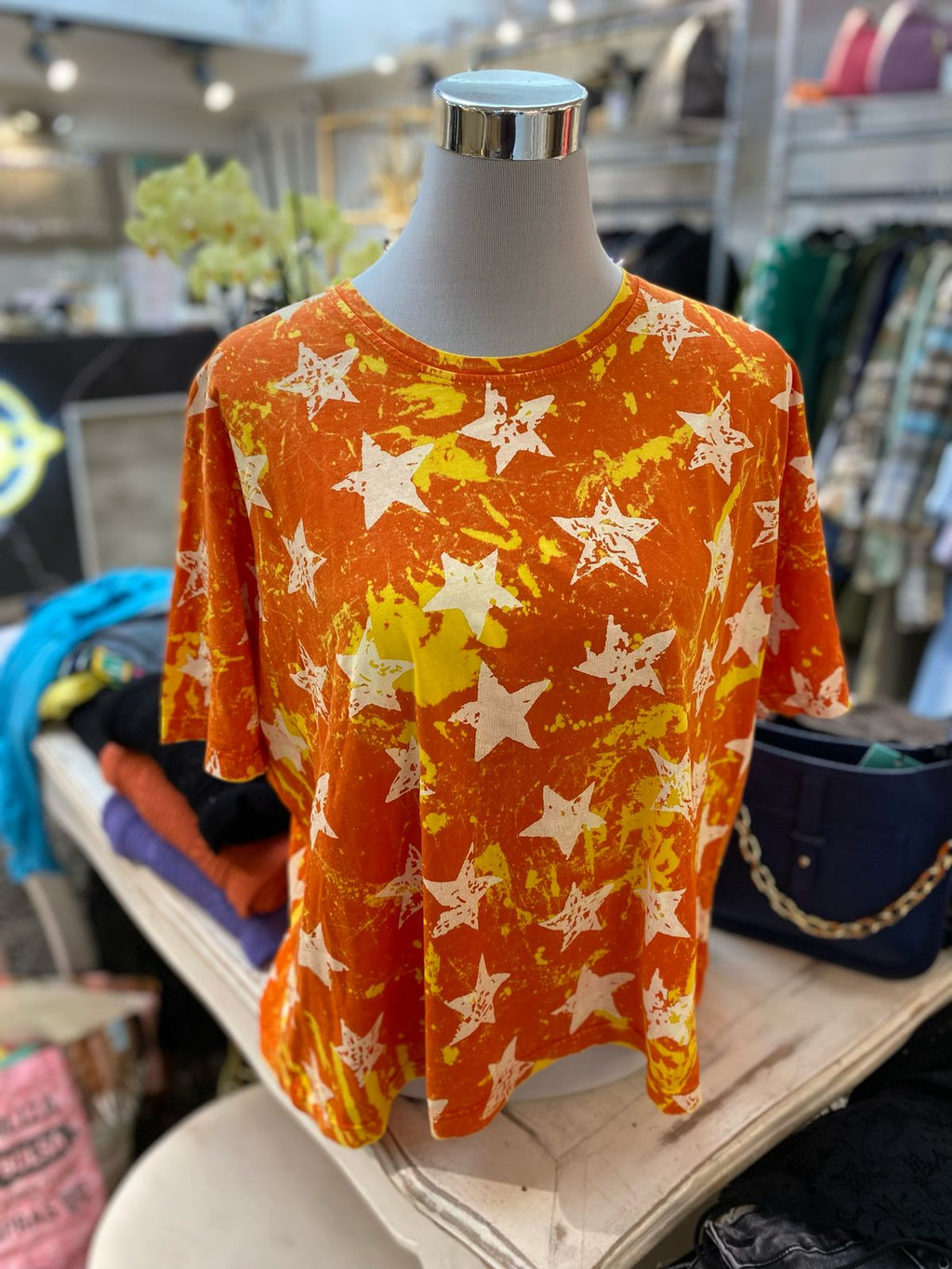 Polera estrellas naranja