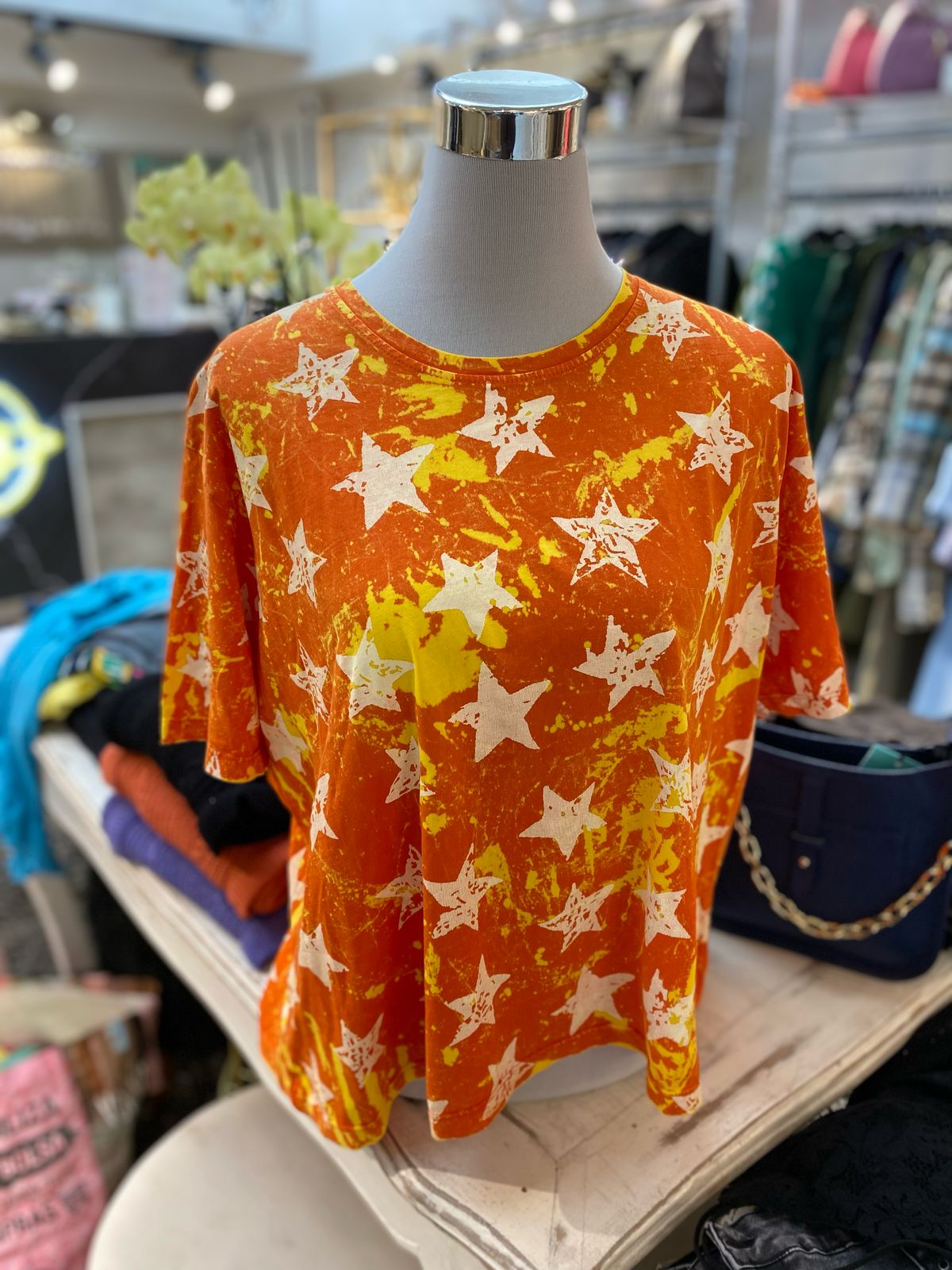 Polera estrellas naranja