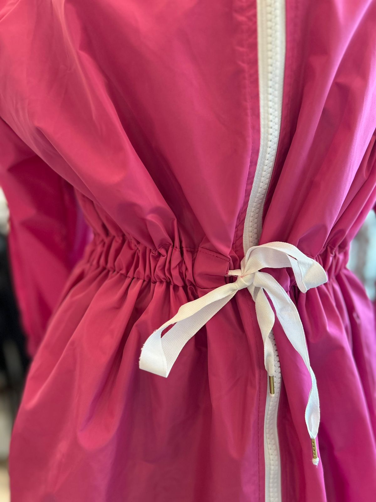 Corta viento fucsia